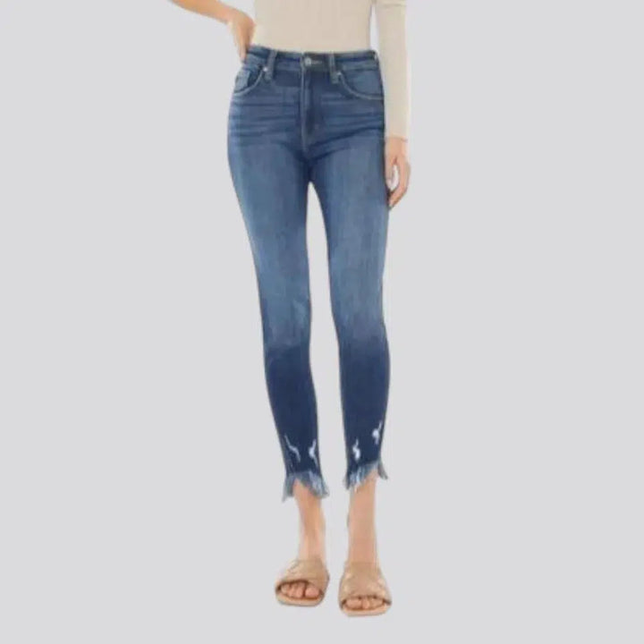 Medium-wash skinny jeans
 for ladies
